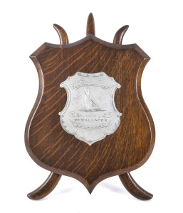 "ST. KILDA YACHT CLUB Season 1899-1900, Won By Mr. Wallace's Sayonara" Australian sterling silver shield mounted on oak, ​42 x 23cm overall