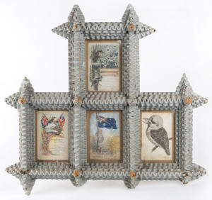 An Australian Folk Art picture frame with gray painted finish housing four Australian themed postcards, early 20th century, 53 x 58cm