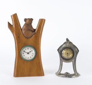 Two Australiana table clocks, one cast spelter with cockatoo decoration, the other with carved timber koala case, ​15cm and 24cm high