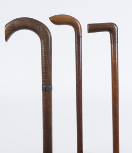 Three Australian walking sticks, blackwood, casuarina, myrtle and sterling silver, 19th and early 20th century, ​the largest 85cm high