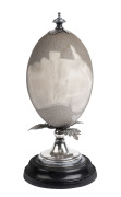 An Australian carved emu egg with lyrebird and Australian map with silver plated mounts on wooden base, late 19th century, ​23cm high