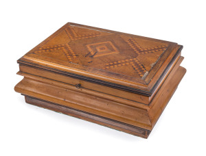 An Australian timber workbox, impressively crafted with inlaid top and serpentine profile, interior fitted with lift out tray and compartments with fine inlay work, cedar, musk, huon pine, blackwood and pine, Barossa Valley, South Australia, 19th century, 14cm high, 35cm wide, 24.5cm deep