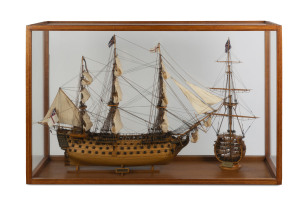 HMS VICTORY model tall ship in glass cabinet with additional cut away cross section model, 20th century, cabinet 80cm high, 127cm wide, 41cm deep