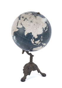An antique terrestrial globe on cast iron base, 19th century, 51cm high