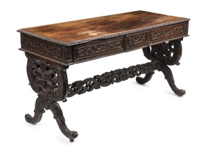 Anglo-Indian sofa table with two drawers, ornately carved padouk, circa 1830, ​71cm high, 134cm wide, 60cm deep