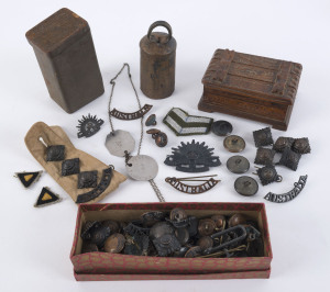 Assorted Australian military buttons, badges, dog tags, bell, souvenir of "Montreux" wooden box and tin of studs