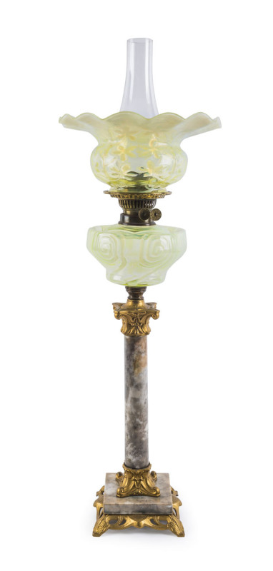 An antique banquet lamp with rare uranium glass shade and font, marble column base with gilt metal mounts and double burner, 19th century, ​81cm high