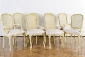 Set of 8 French style dining chairs. 6 standards & 2 carvers. Cream finish with beige upholstery.