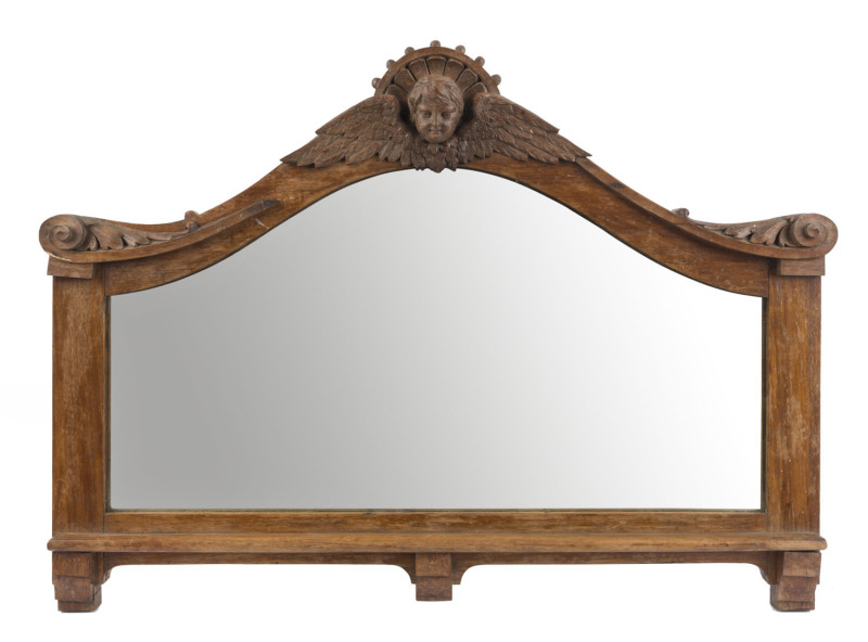 FRANCIS EDMOND STRIEZEL (attributed), (1860-1935), wall mirror, carved blackwood with cherub decoration, 48 x 99cm PROVENANCE: Private collection Melbourne, previously by direct Striezel family descent.