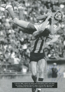 Folio of signed AFL/VFL images; mostly autographed large format press cuttings/photos, many showing spectacular "grabs", noting Jack Dyer, Kevin Murray, Billy Brownless, Warwick Capper, Ron Barassi, Bobby Skilton, Tony Lockett, James Hird, Michael Voss, Dick Reynolds, Peter Hudson & Royce Hart. (40 approx).