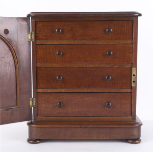 An Australian apprentice cabinet fitted with four drawers, cedar with fiddleback blackwood interior, circa 1880, ​35cm high, 31cm wide, 22cm deep