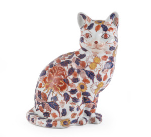A Japanese Imari porcelain cat statue, Meiji period, 19th century, six character mark to base, 28cm high