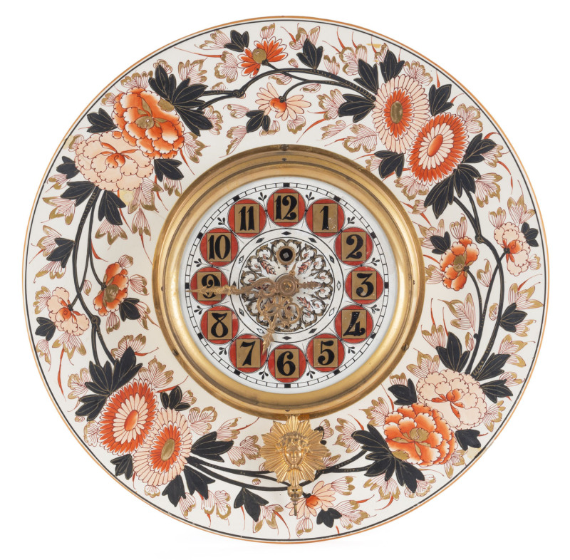 A French wall clock on Imari porcelain, time piece only with sunburst pendulum, late 19th century, ​39cm diameter