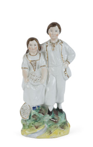 Staffordshire pottery figural group of a girl and boy, circa 1840, ​21cm high