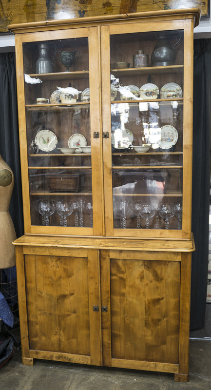 A Scandinavian Biedermeier bookcase, solid satin birch, 19th century, 238cm high, 124cm wide, 46cm deep