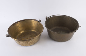 Two preserving pans, brass with iron swing handles, late 19th century, ​38cm diameter