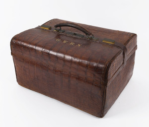 A crocodile skin doctor's bag with gilt monogram "G.W.R.N.", late 19th century, ​41cm across