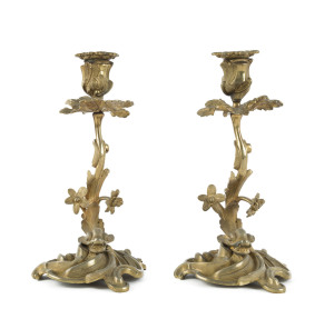 A pair of French Empire dolphin candlesticks, gilt bronze, circa 1840, 26cm high