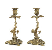 A pair of French Empire dolphin candlesticks, gilt bronze, circa 1840, ​26cm high