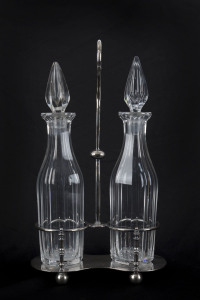 An English silver plated decanter stand with two crystal decanters, 19th century, ​36.5cm high