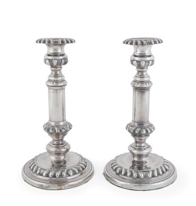 A pair of antique English telescopic silver plated candlesticks, 19th century, 23cm high, extends to 29cm high
