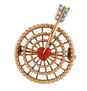 CARTIER vintage brooch, 9ct rose gold spider web with coral heart being pierced by a rose gold arrow set with six white diamonds in platinum mount, circa 1930s, stamped "Cartier, France, 9kts," serial no. 3/992, 4.25cm across, 9.3 grams