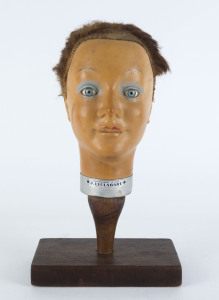 A French mannequin shop display head with unusual haircut, circa 1930s, ​40cm high
