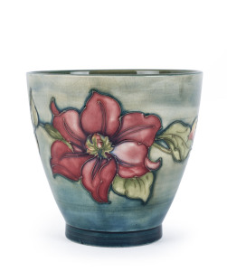 MOORCROFT floral pattern pottery vase on green ground, circa 1930s, impressed "Moorcroft, Made In England", 12cm high