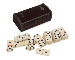 Georgian pocket dominoes, carved bone tiles in silver mounted timber dome topped box with silk lining, early 19th century, ​the box 9.5cm wide
