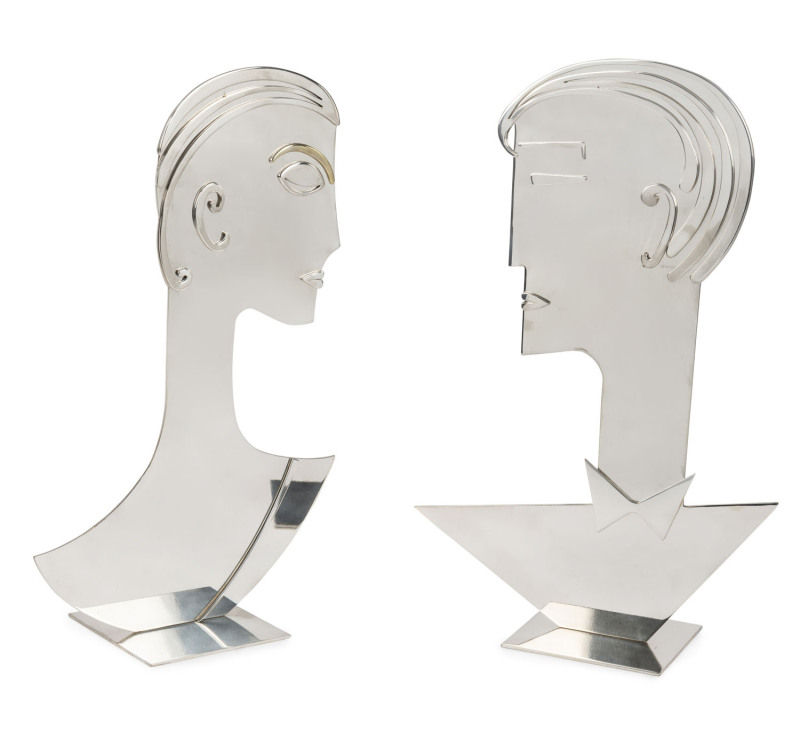 HAGENAUER pair of nickel plated bronze heads designed by Franz Hagenauer, circa 1950, stamped "Made In Austria" with "WHW" circular mark, ​51cm and 49cm high
