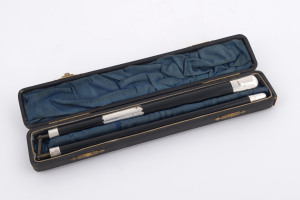 A conductor's baton, sterling silver and ebony, inscribed "Presented To Mr. Fred Dearnley In Recognition Of His Valuable Services In The Utley Wesleyan Sunday School, August 15th, 1909". In original silk lined leather case. ​46cm long