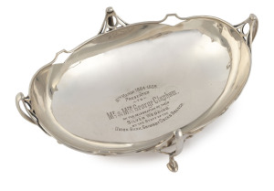 An English Art Nouveau sterling silver bowl with presentation inscription "6th March 1884-1909, To Mr. & Mrs George Clapham On The Celebration Of Their Silver Wedding, By The Staff Of The Union Bank, Grimsby Docks Branch", made in Birmingham, circa 1908, 