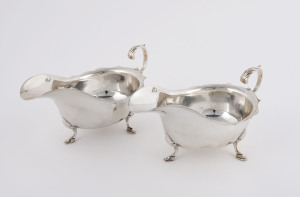 A pair of sterling silver gravy boats by the Baker Bros. of Chester, circa 1907, 17cm across, 365 grams total