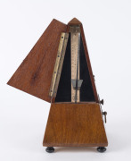 A French metronome with clockwork movement in walnut case, early 20th century, 23cm high - 2