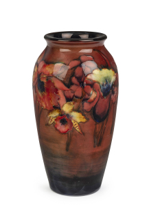 MOORCROFT flambe "Orchid" pattern vase, circa 1930s, stamped "Made In England, Moorcroft (incised signature), Potter To H.M. The Queen", 19.5cm high