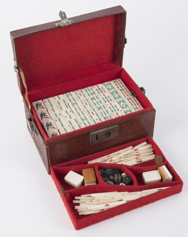 Chinese Mah-Jong set with bone and bamboo tiles in fitted leather case, circa 1920, ​the case 13cm high, 21cm wide, 14cm deep
