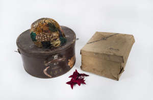 A lady's feather hat, hat box and hat case, early 20th century, the case 38cm high