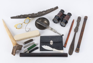 Antique ear horn, tribal artefacts, pocketknives, rolling rulers, paper knife, brush, glasses, binoculars and wallet, 19th and 20th century, (16 items), ​the ear horn 24cm