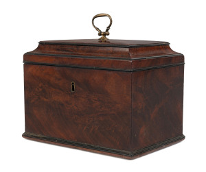 A Georgian flame mahogany tea caddy with brass handle, circa 1795, ​14cm high, 17cm wide, 12cm deep