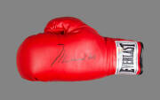 MUHAMMAD ALI, signature on 'Everlast' boxing glove. With 'Online Authentics' No.OA-7847336.