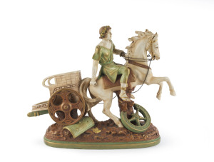 AMPHORA Austrian porcelain chariot statue, circa 1900, circular impressed mark "Imperial Amphora, Turn, Austria" with crown, 41cm high, 54cm long