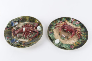 Two Portuguese majolica pottery plaques, 19th century, 23cm and 24cm diameter