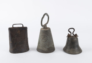 Three assorted antique bronze and iron bells, 19th century, ​the tallest 22cm high