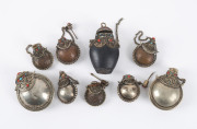 Nine assorted Sino-Tibetan scent bottles, coin silver, copper, coral and turquoise, 19/20th century, ​the largest 6.5cm high