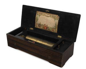 A Swiss music box with 12 tunes, 28cm cylinder, walnut and marquetry case, 19th century, ​15cm high, 57cm wide, 22cm deep