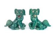 A pair of Chinese ceramic lion statues, mid 20th century, ​55cm high