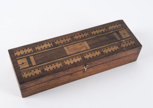 Antique cribbage board topped box with antique playing cards and whalebone pegs, 19th century, 26.5cm wide