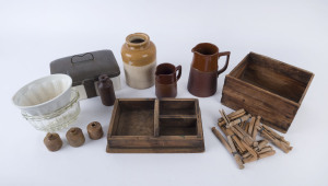 KITCHENALIA, 2 jelly moulds, 2 pottery jugs, lunchbox, stone ware jar, bottle and 3 inkpots, assorted antique wooden pegs and 2 timber boxes, 19th and early 20th century, (12 items). the jar 20cm high