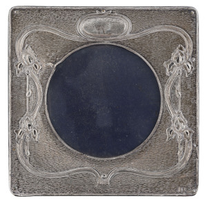 An English Art Nouveau sterling silver picture frame, Birmingham, circa 1903, ​15.5 x 15.5cm