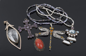 Five assorted vintage pendants set in silver, one on pearl chain, the dragonfly 9cm high